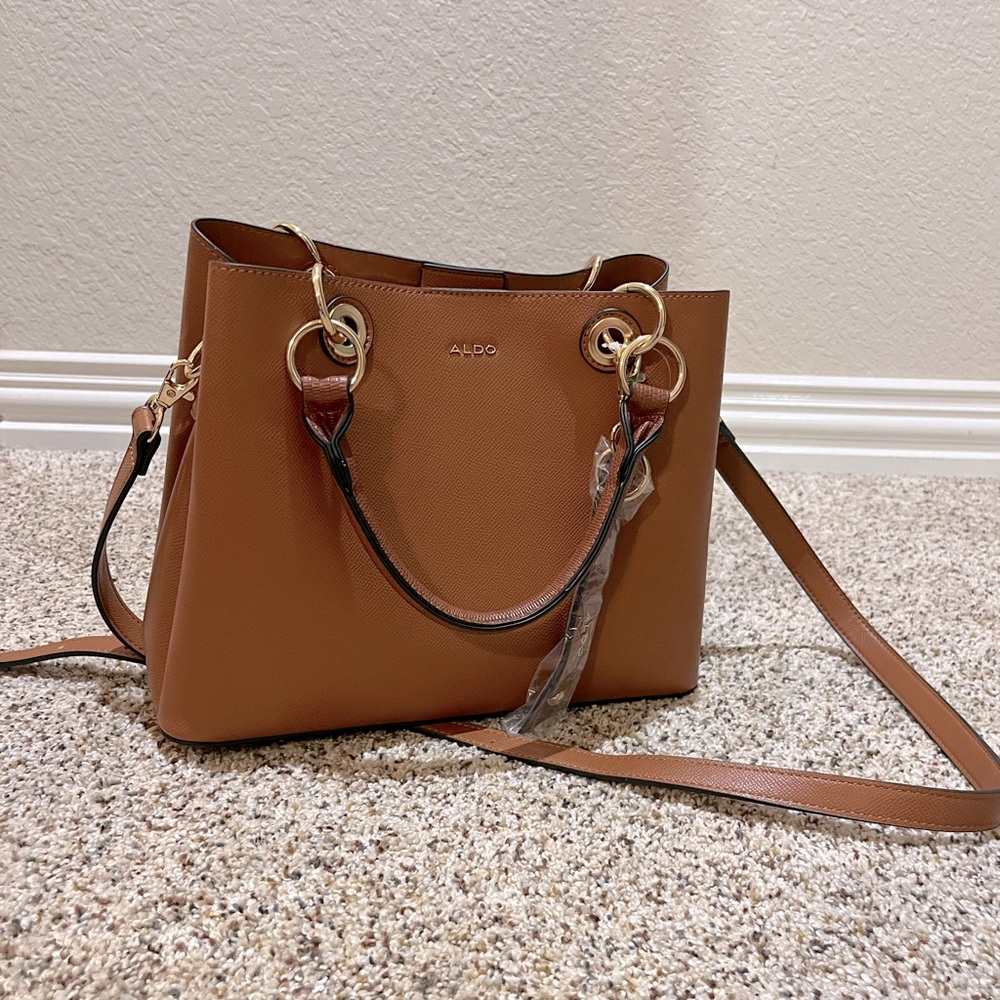 Brand new Aldo cross-grain purse. Never used. Brown handbag w/ shoulder strap.